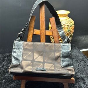 Chic Black and Brown Shoulder Bag with Sleek Design